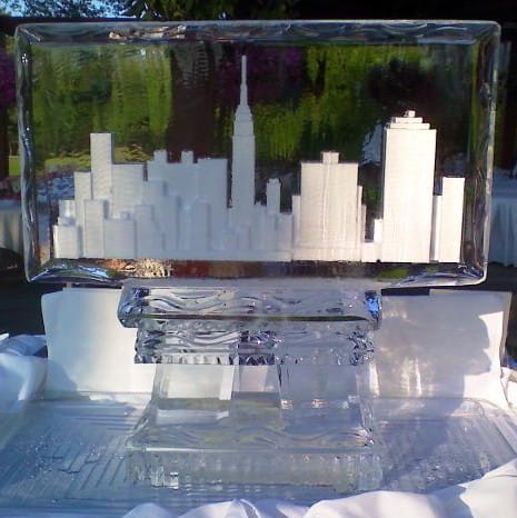 Outdoor candle display inside ice sculpture
