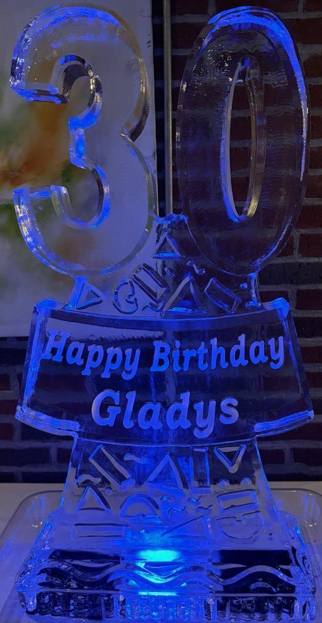 Blue illuminated Happy Birthday 30 ice sculpture