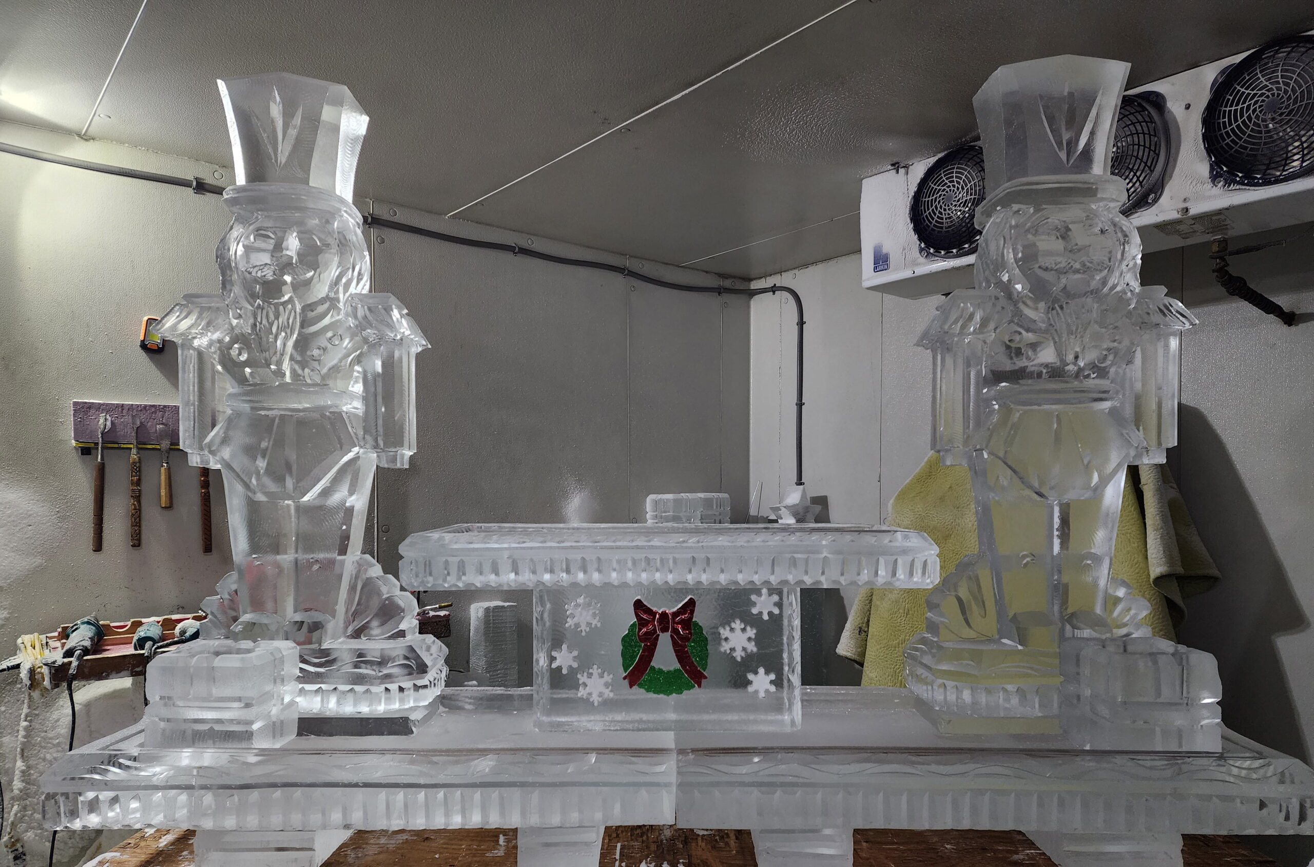 Ice matters 80 inch base tray with nutcracker on each side of festive raised tray and two lemon holders