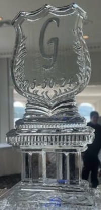 Round engraved emblem ice sculpture centerpiece