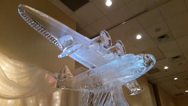 Dolphin-themed ice sculpture centerpiece