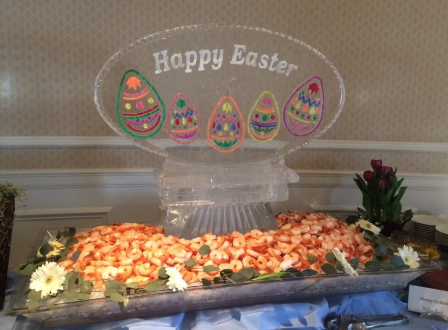 Happy Easter ice sculpture with colorful eggs