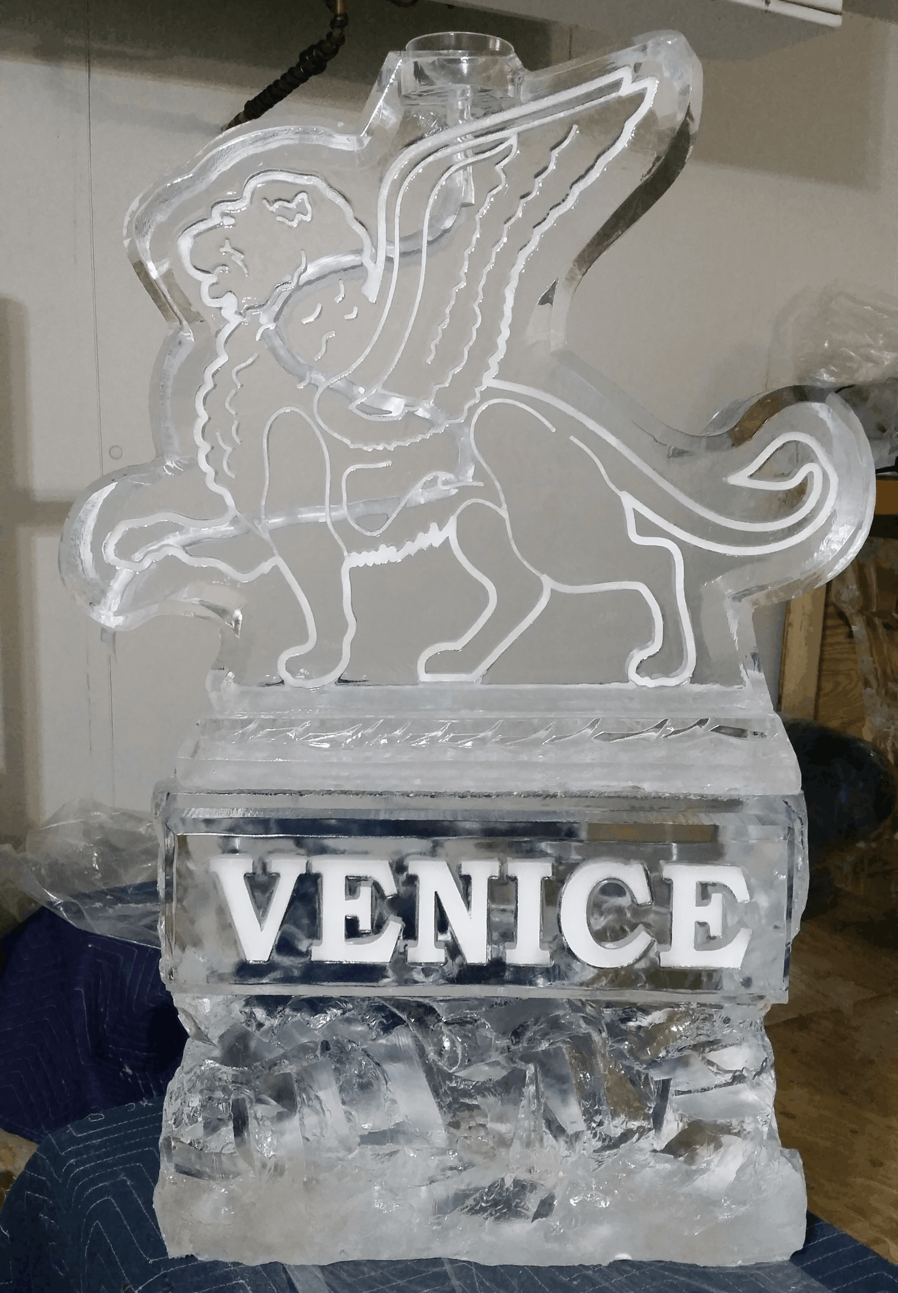 Venice-themed ice sculpture with lion design