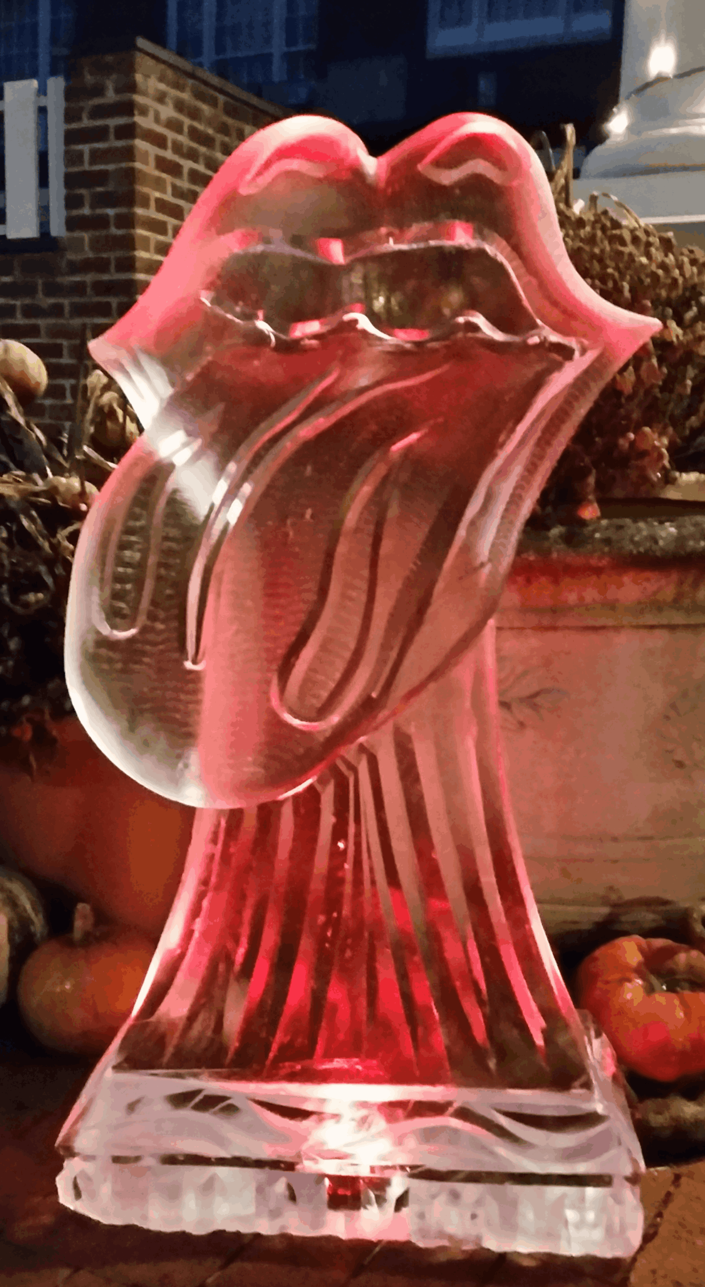 Purple illuminated Oscar-style ice sculpture