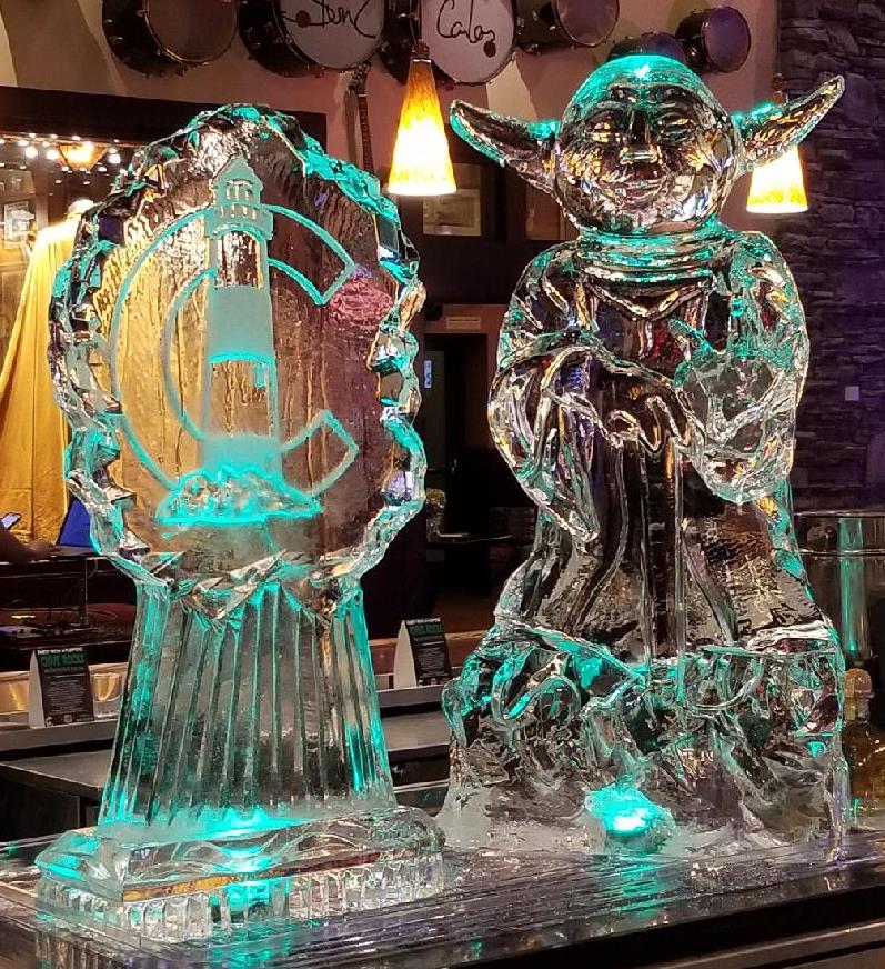 Detailed Star Wars Yoda character ice sculpture with dynamic lighting