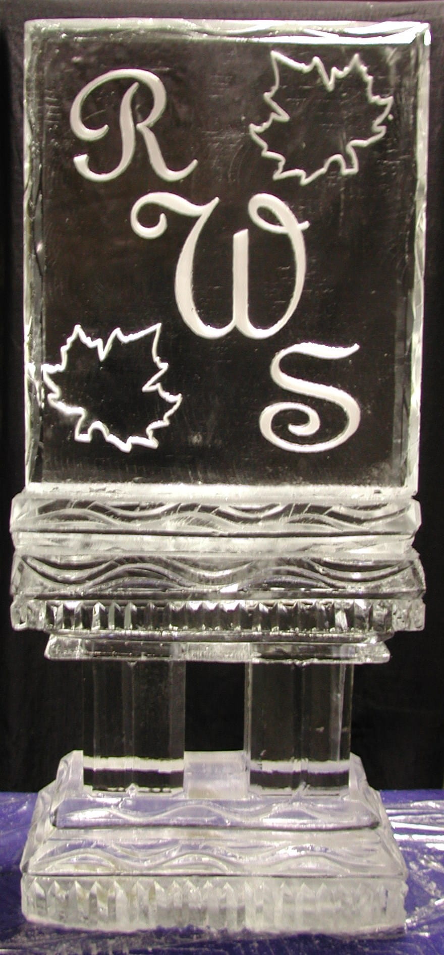 Custom initials WS engraved ice sculpture with maple leaf