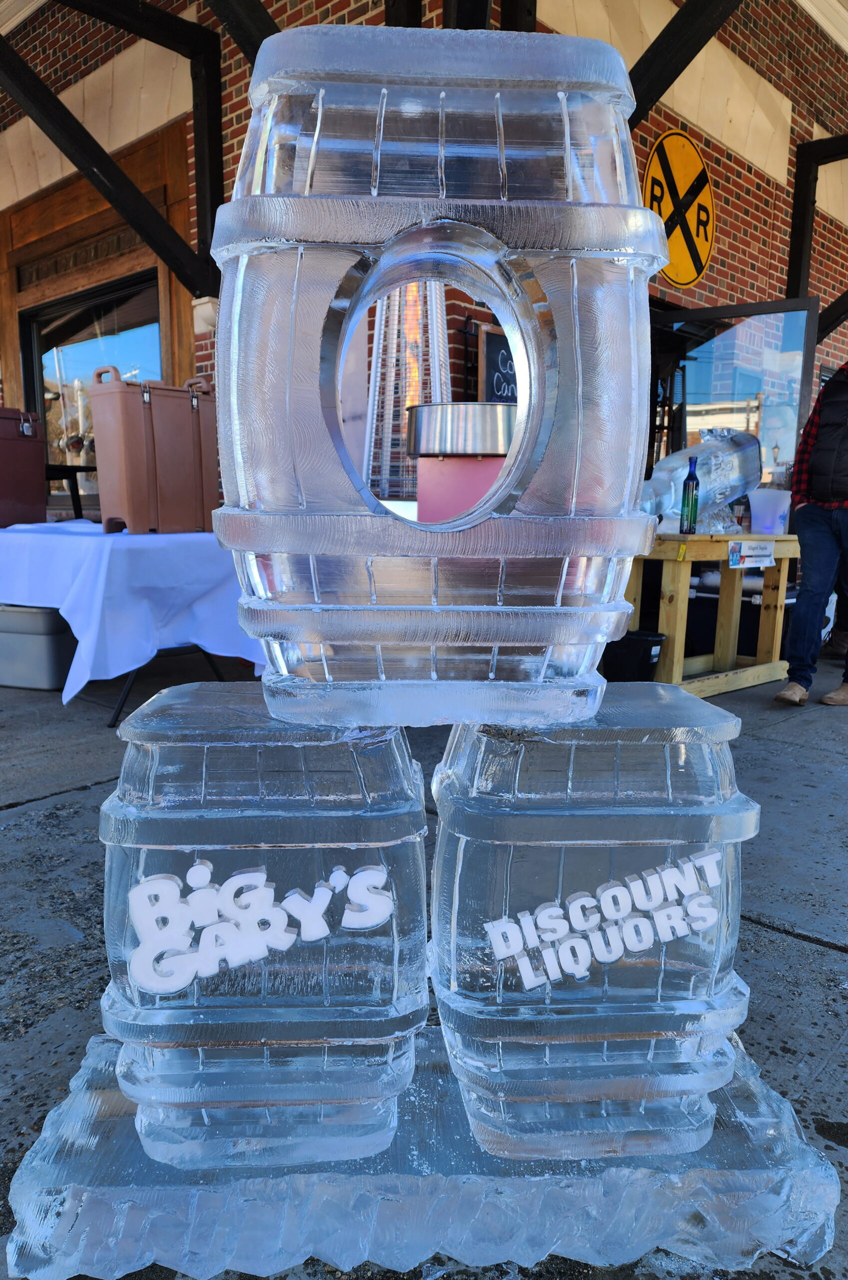 Circular monogram ice sculpture centerpiece