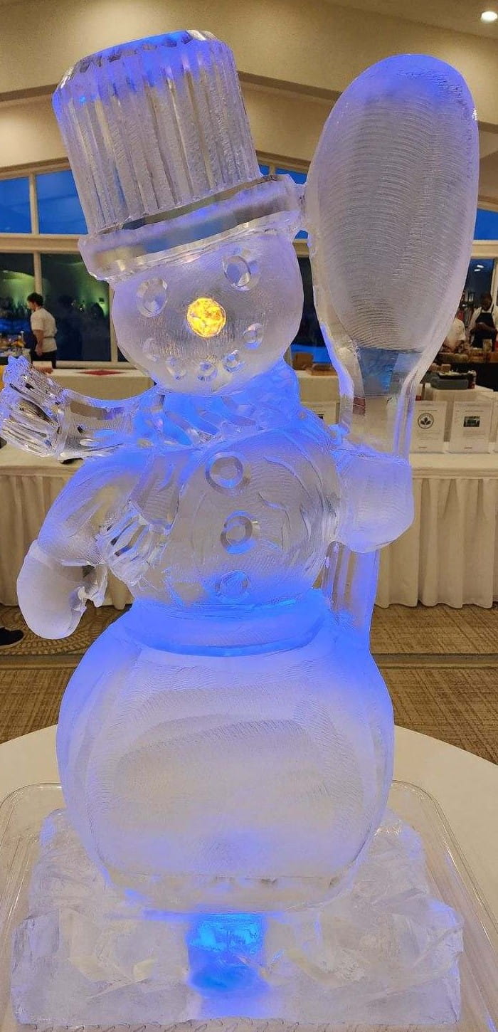 Ice matters - snowman with chef toque holding spoon