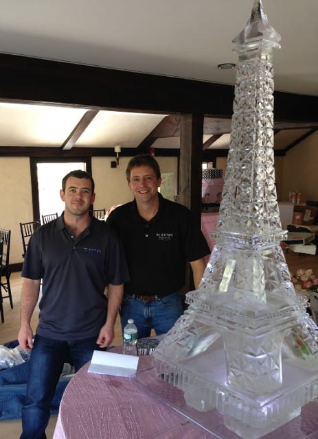 Eiffel Tower ice sculpture with event guests