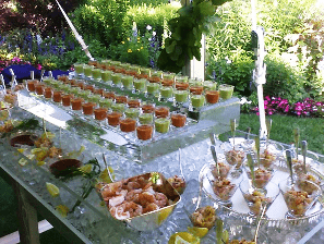Outdoor cocktail reception with ice buffet display