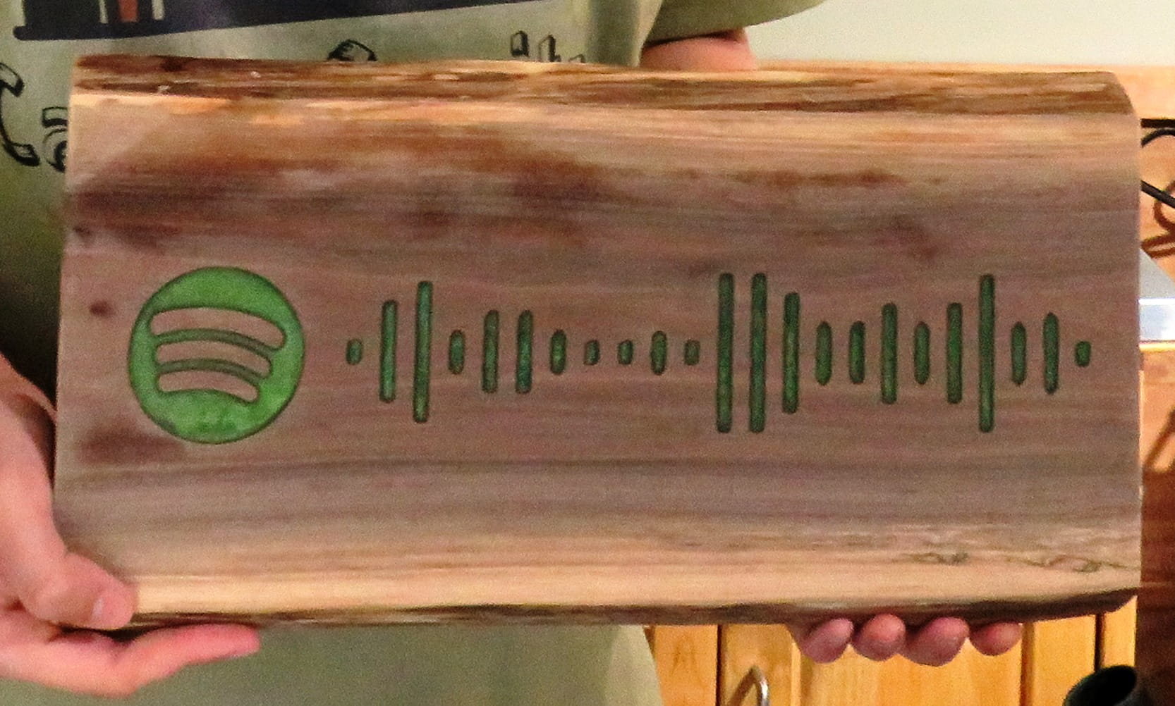 Natural wood plaque engraved with a custom soundwave or pulse line