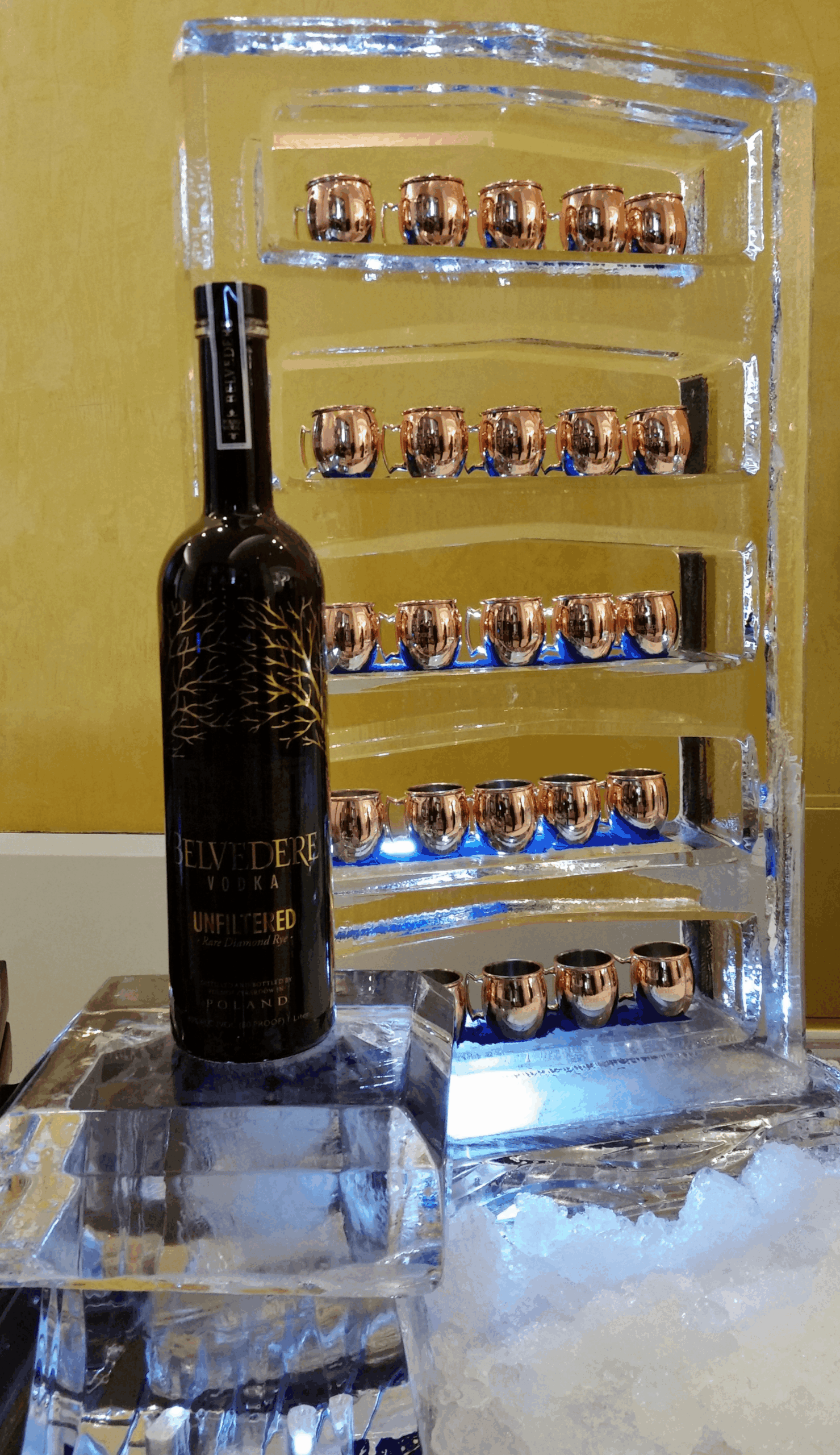 Wine bottle display with custom ice sculpture