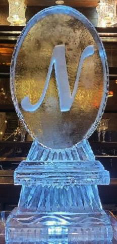 Monogram letter M engraved ice sculpture centerpiece