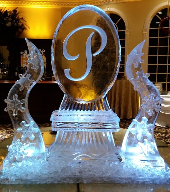 Monogram ice sculpture featuring illuminated letter P