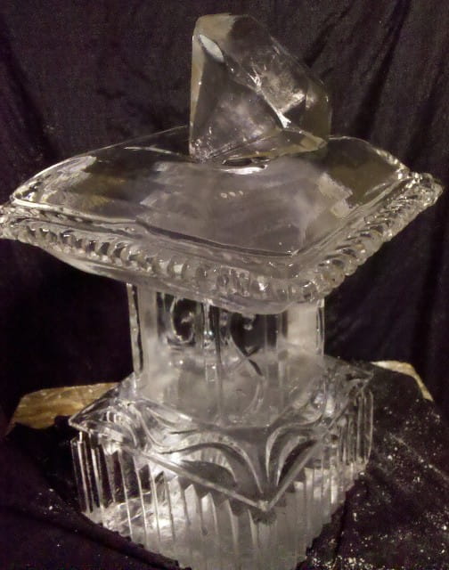 Square ice pedestal with decorative carved top