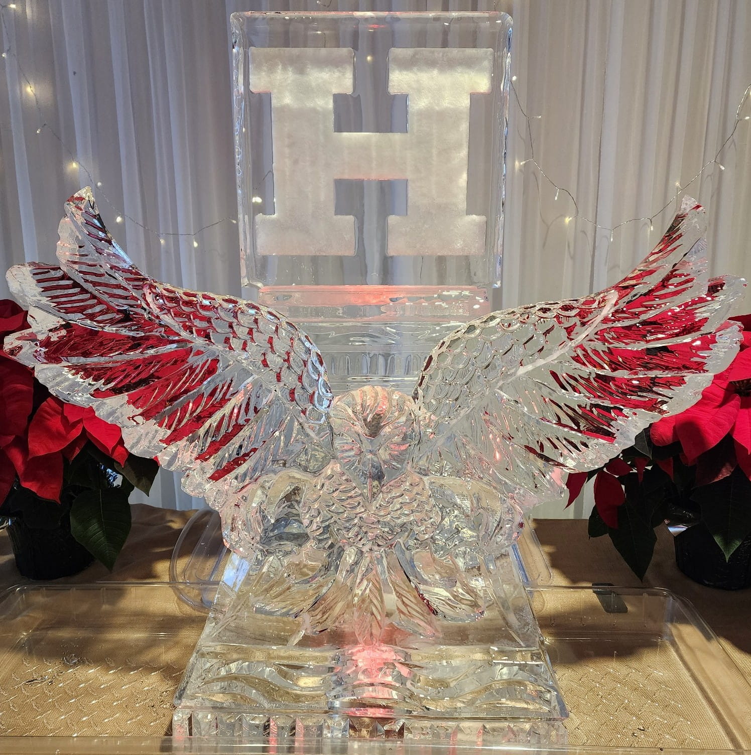 Eagle wings ice sculpture centerpiece